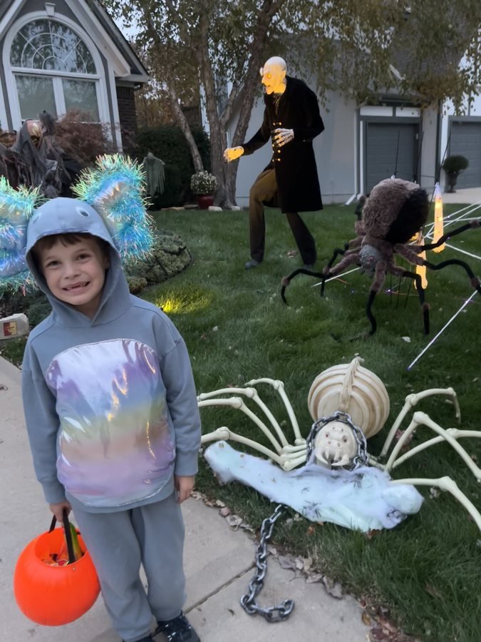 Teddy trick-or-treating in a homemade costume