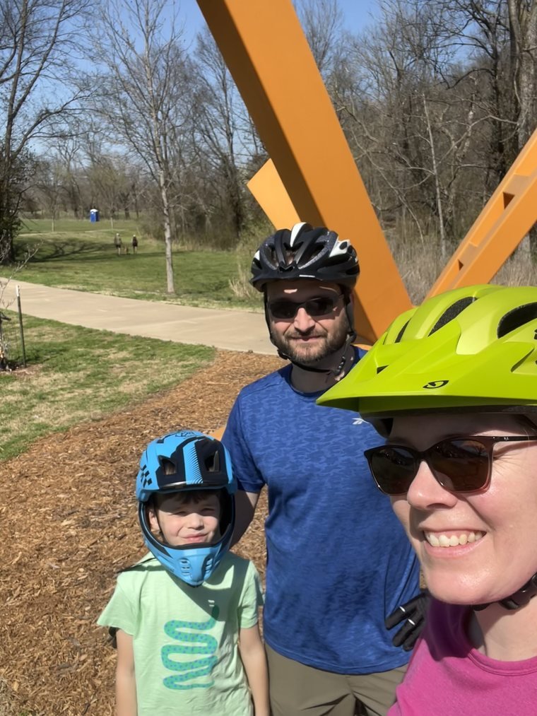 Dr. Baird with her family on a biking trail in Northwest Arkansas